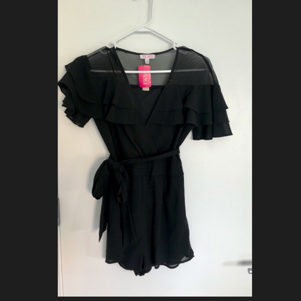 Black Ruffled Romper from Akira . BRAND NEW !
